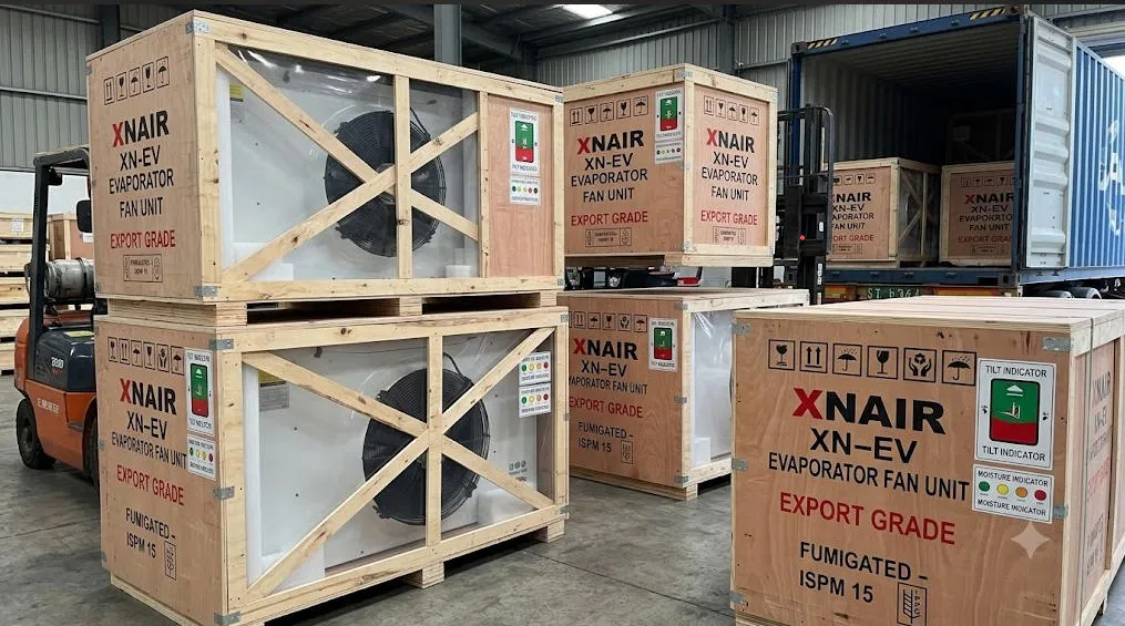 XNAIR evaporator fan units packed in fumigated export-grade plywood crates with internal bracing for ocean freight shipping container transport